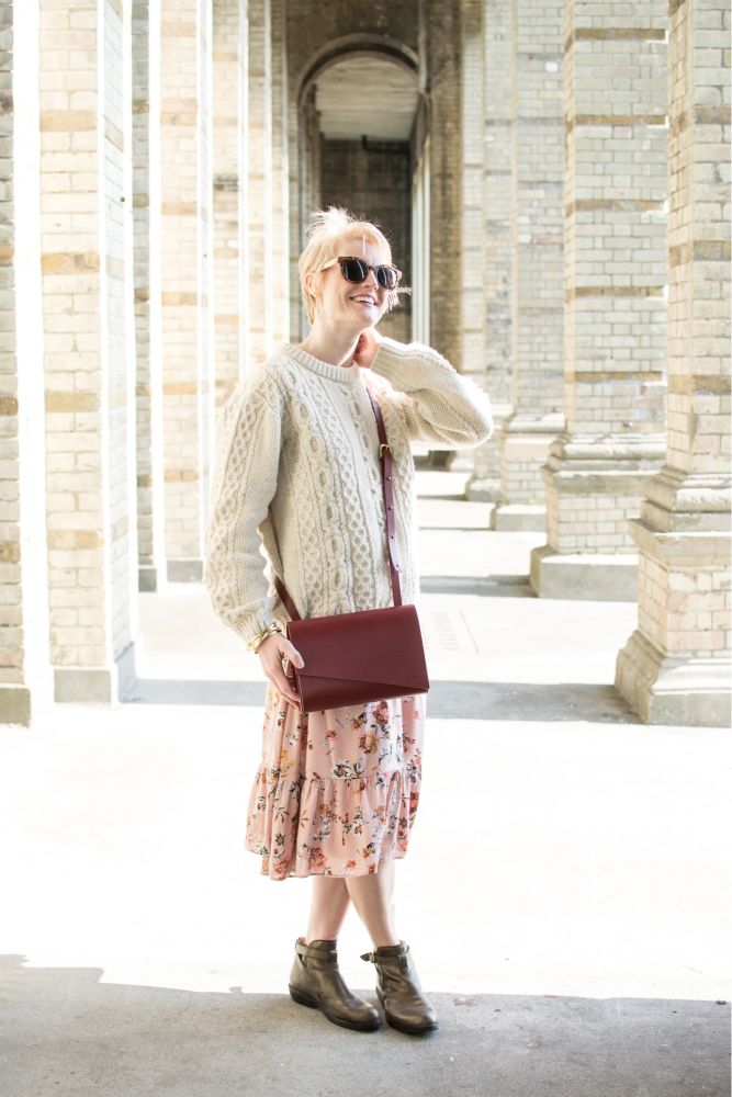 Blogger N4Mummy wearing the CARV Pioneer Midi Crossbody Leather Bag in red