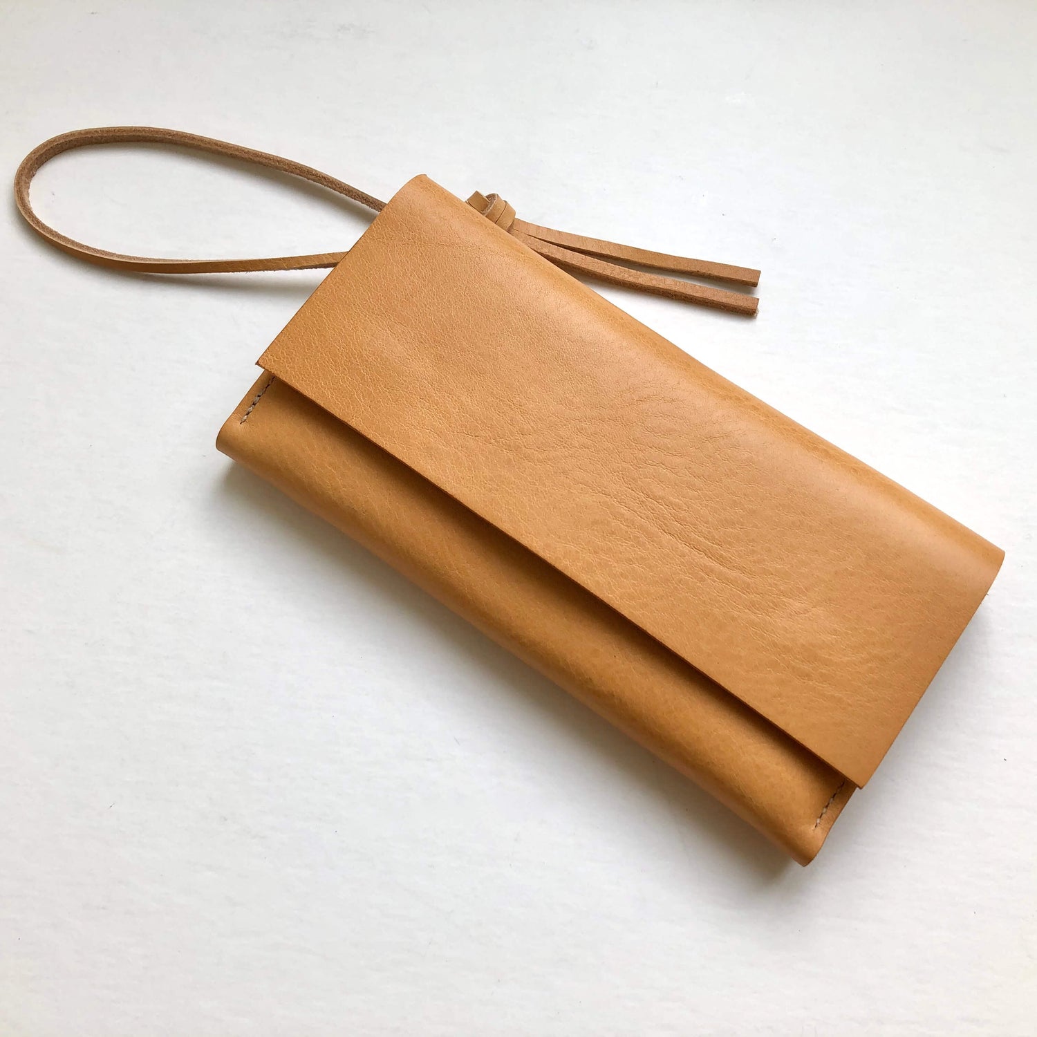 CARV minimalist leather women's wallet purse in natural tan with wrist strap