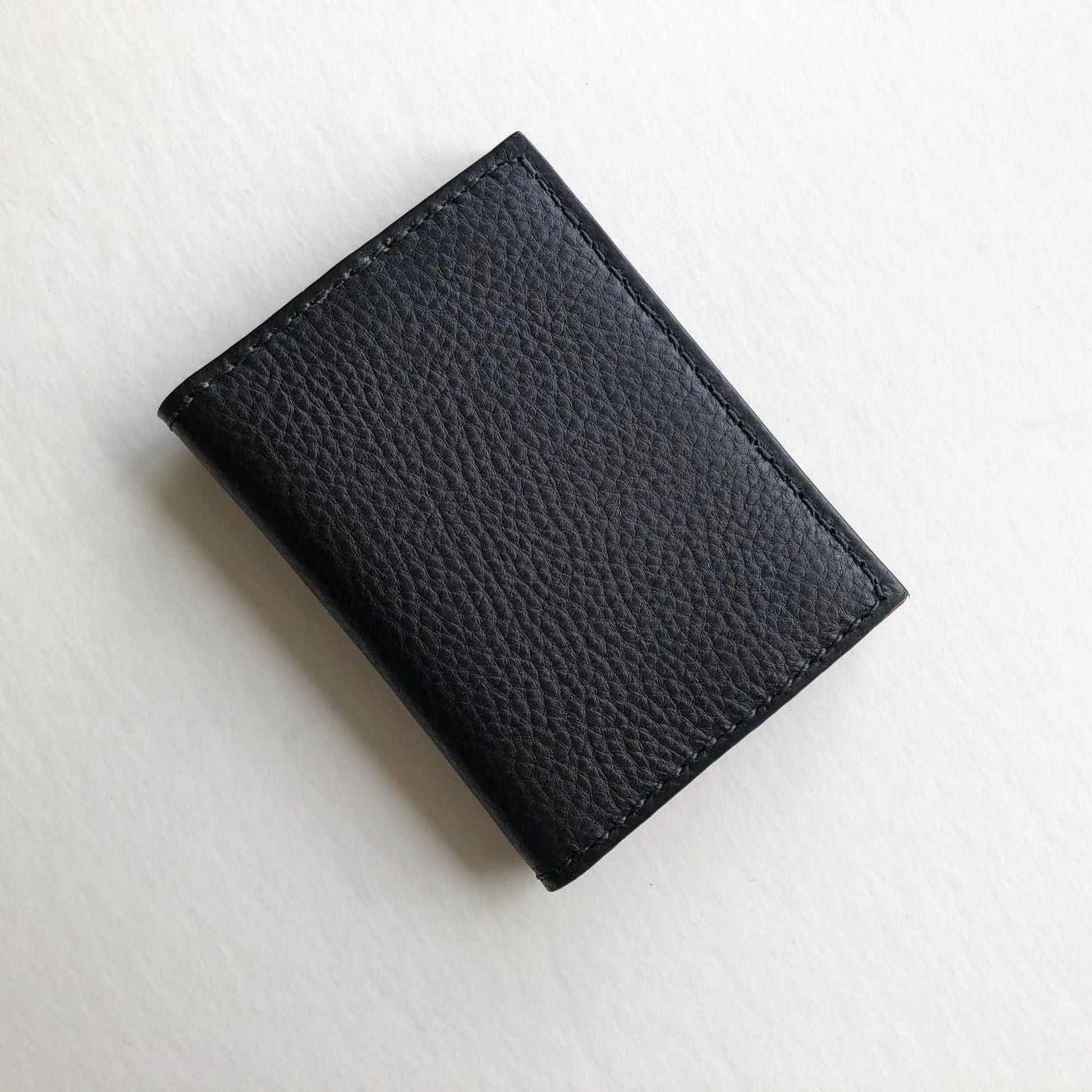 Hand Stitched Black Leather Bifold Card Wallet by CARV, showcasing pebble leather texture.