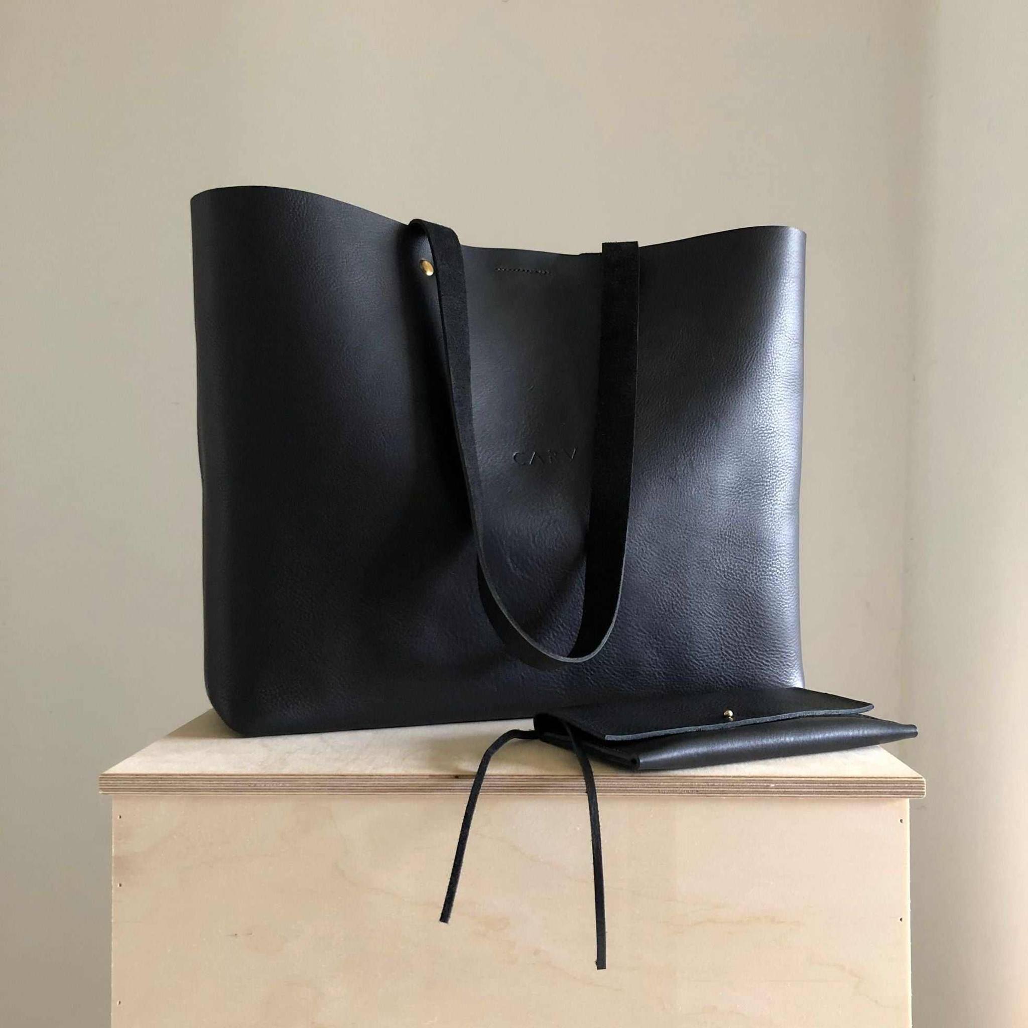 Basket Maxi Leather Tote Bag in black, showcasing its elegant design and spacious interior, perfect for work or casual outings.