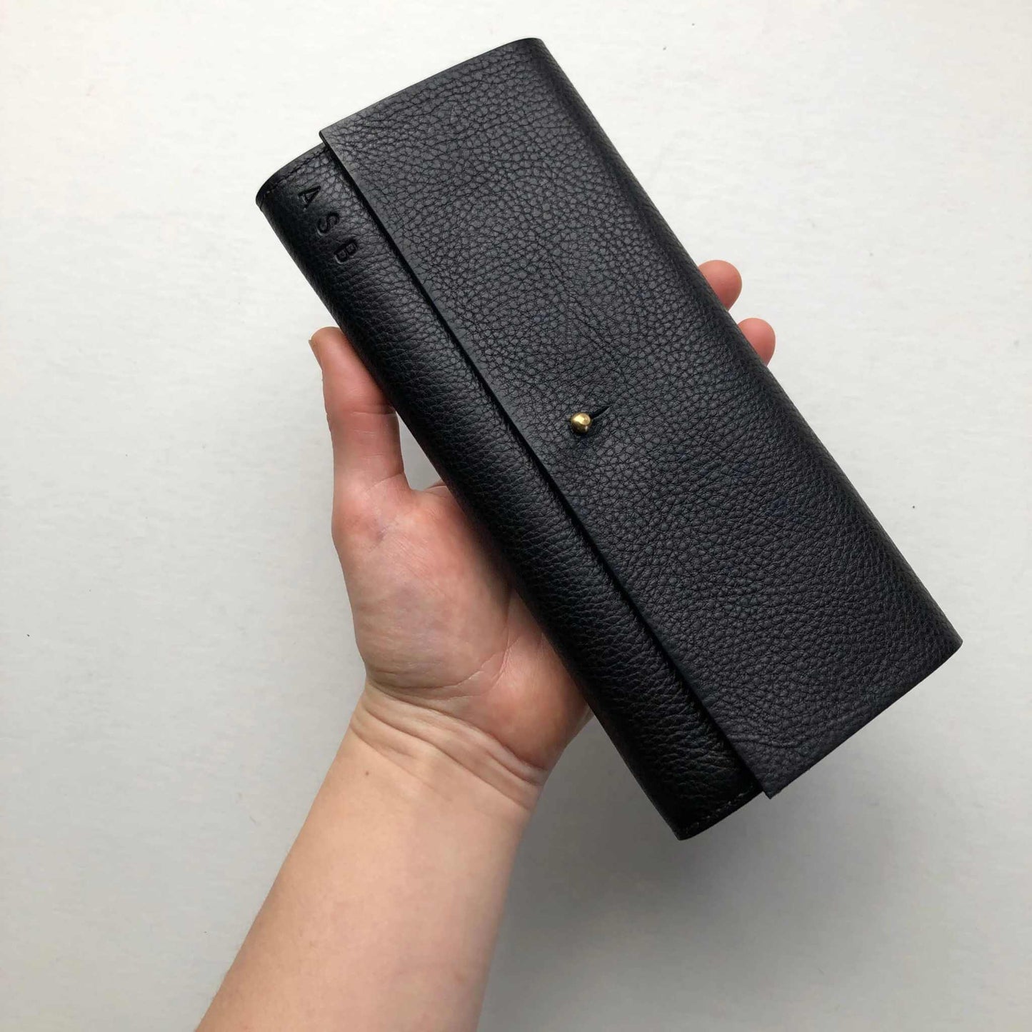 Nomad Maxi Leather Folding Wallet Purse in Black, handmade, vegetable-tanned leather, minimalist design, sustainable fashion.