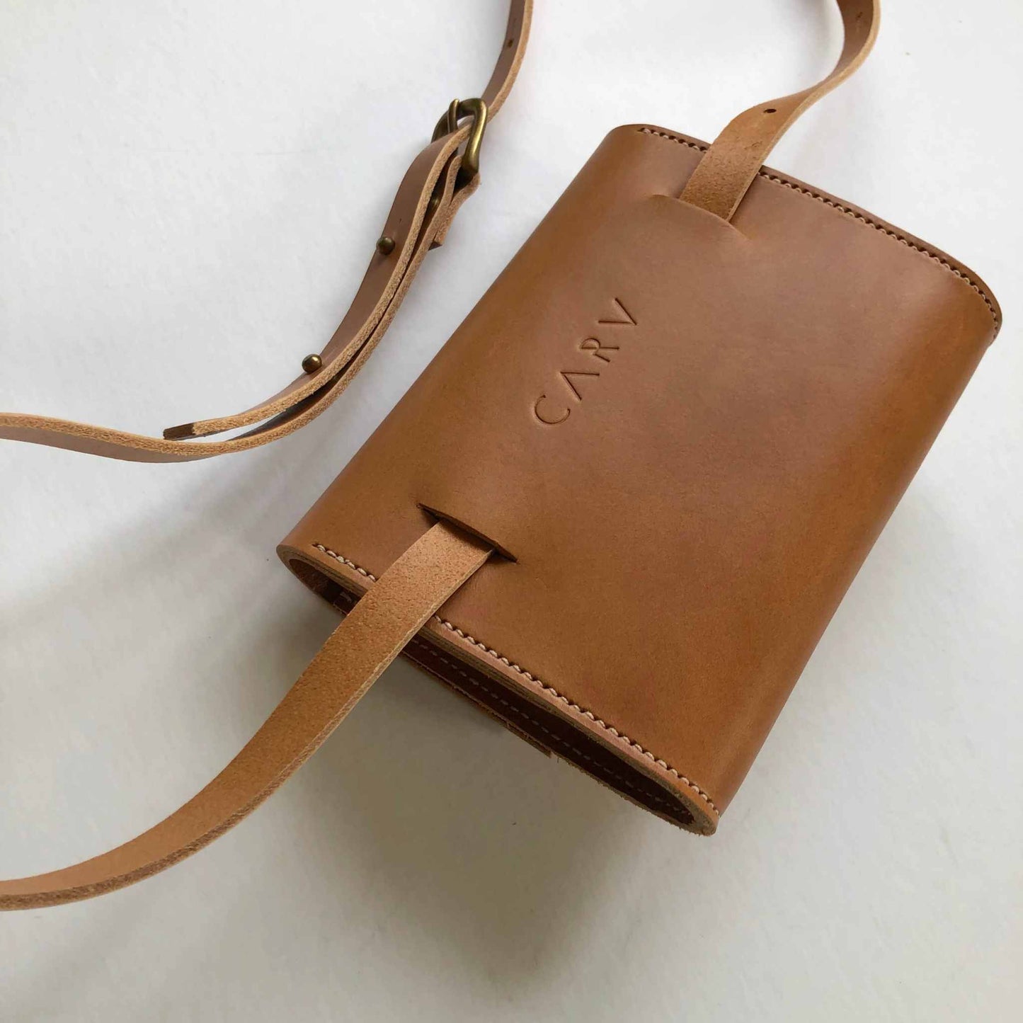 Sedna Tan Leather Belt Bag by CARV, minimalist design, sustainably sourced, versatile waist, crossbody, or shoulder bag.