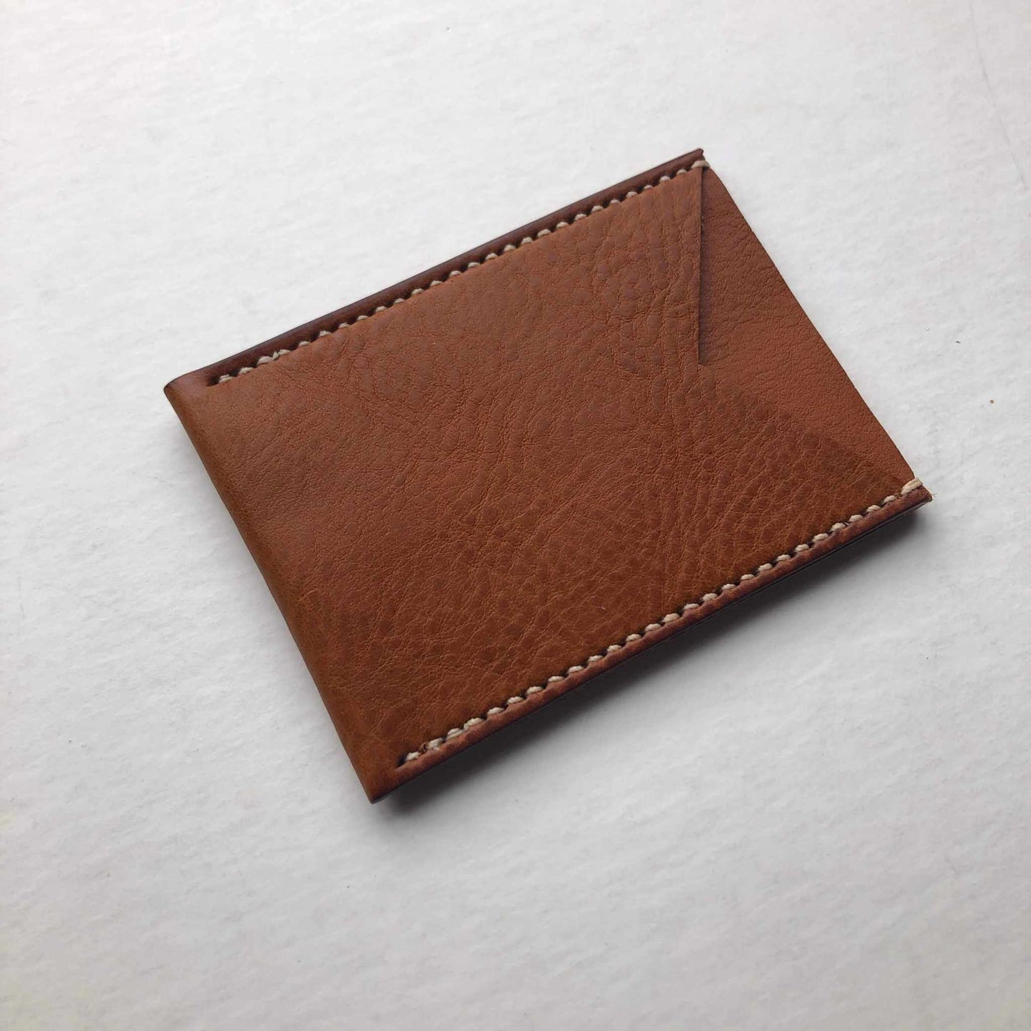 Nomad Leather Card Wallet Sleeve in tan, minimalist design, vegetable-tanned leather, holds up to 4 cards, compact luxury.