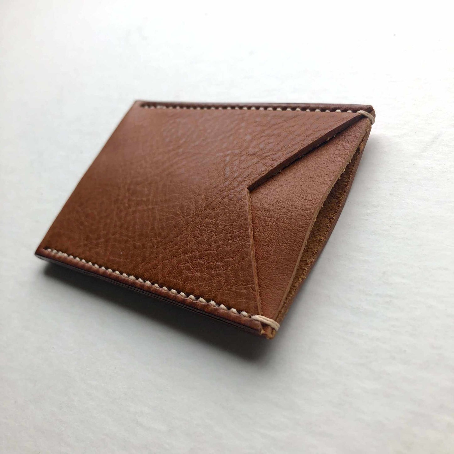 Nomad Leather Card Wallet Sleeve in tan raised grain leather, minimalist design, crafted in Devon, UK.