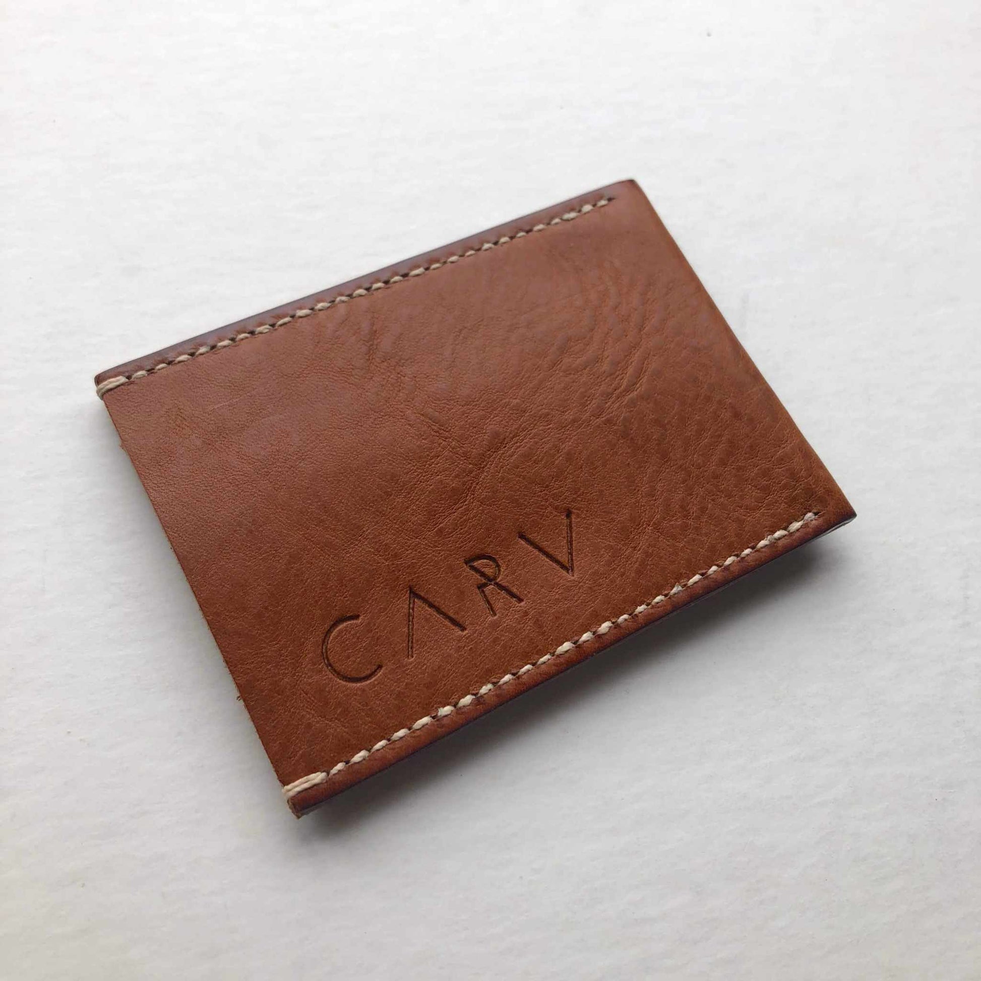 Nomad Leather Card Wallet Sleeve in tan leather, minimalist design, fits 4 cards and notes, made in Devon, UK.