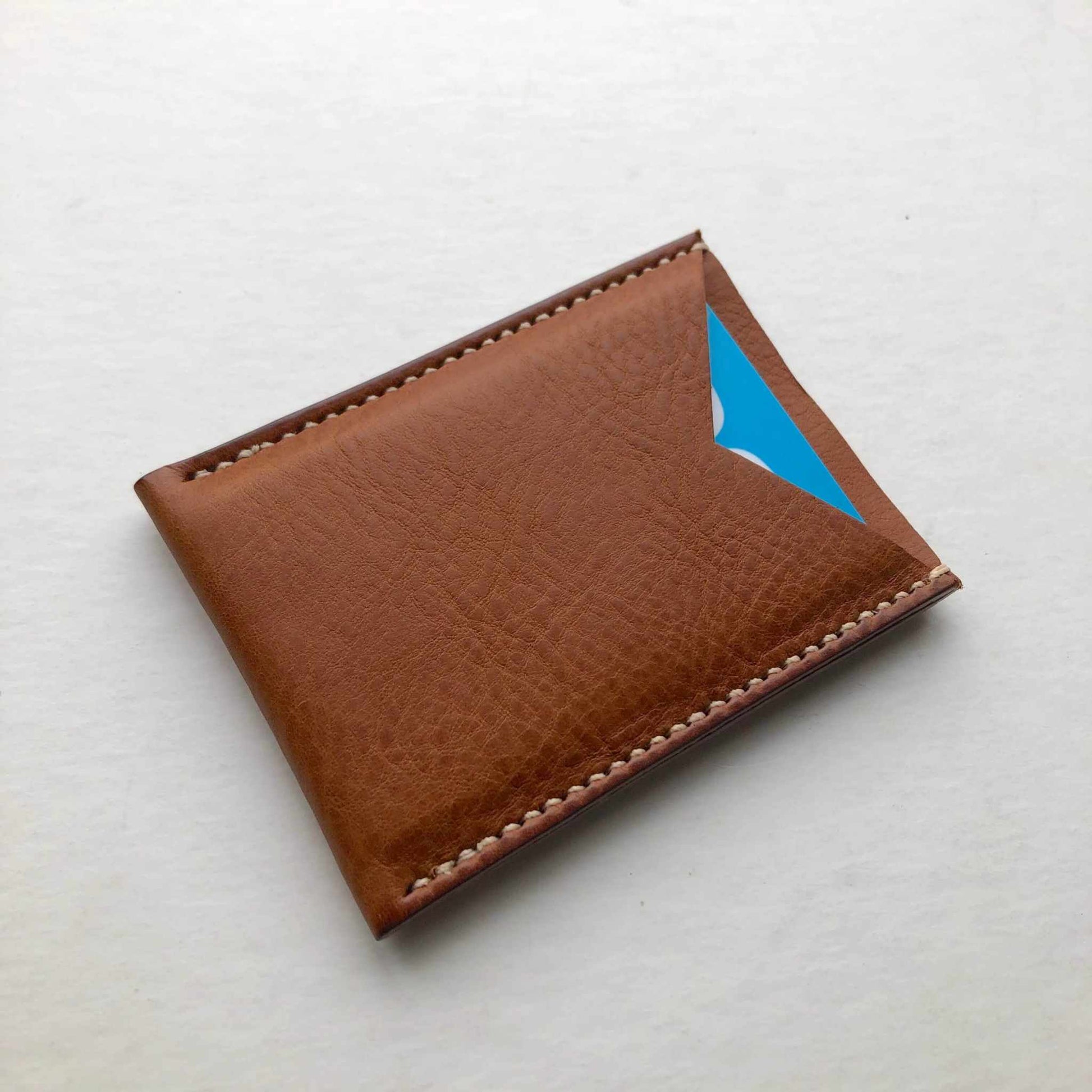 Nomad Leather Card Wallet Sleeve in tan leather, minimalist design, holds up to 4 cards and notes.