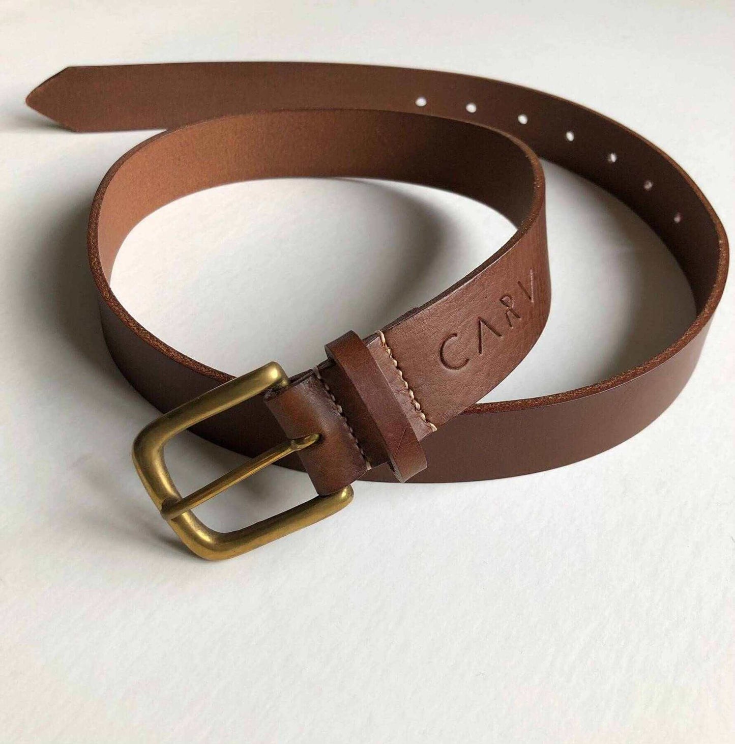 Stitched wide leather belt in tan with brass buckle, handcrafted from vegetable-tanned leather.