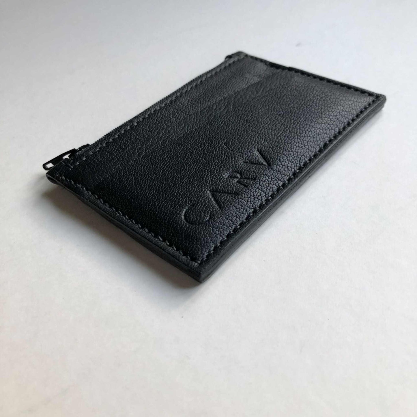 Zipped Leather Card Holder in black, minimalist design, handcrafted, vegetable-tanned leather, CARV.