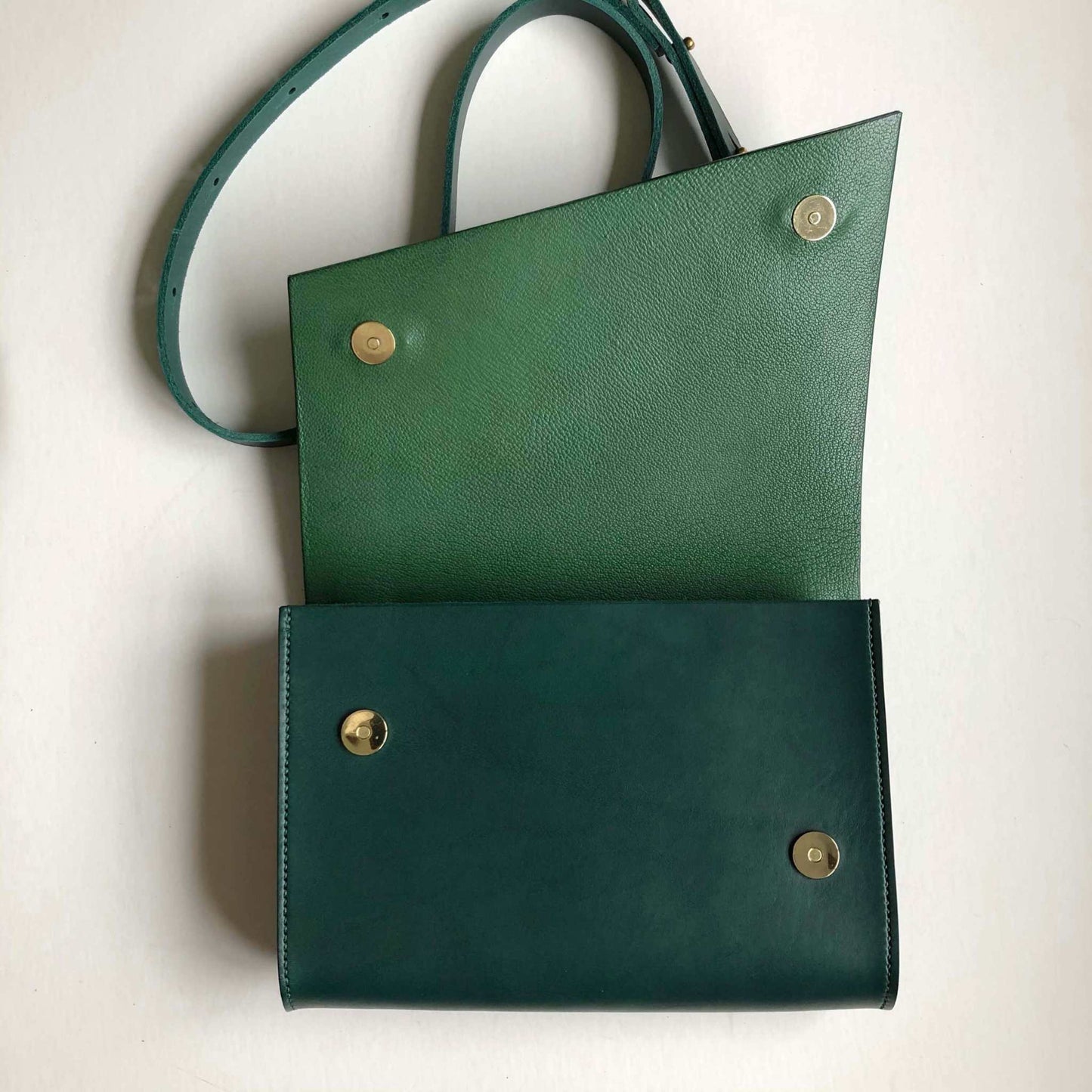 Pioneer Midi Green Leather Crossbody Bag with adjustable strap and asymmetrical flap.