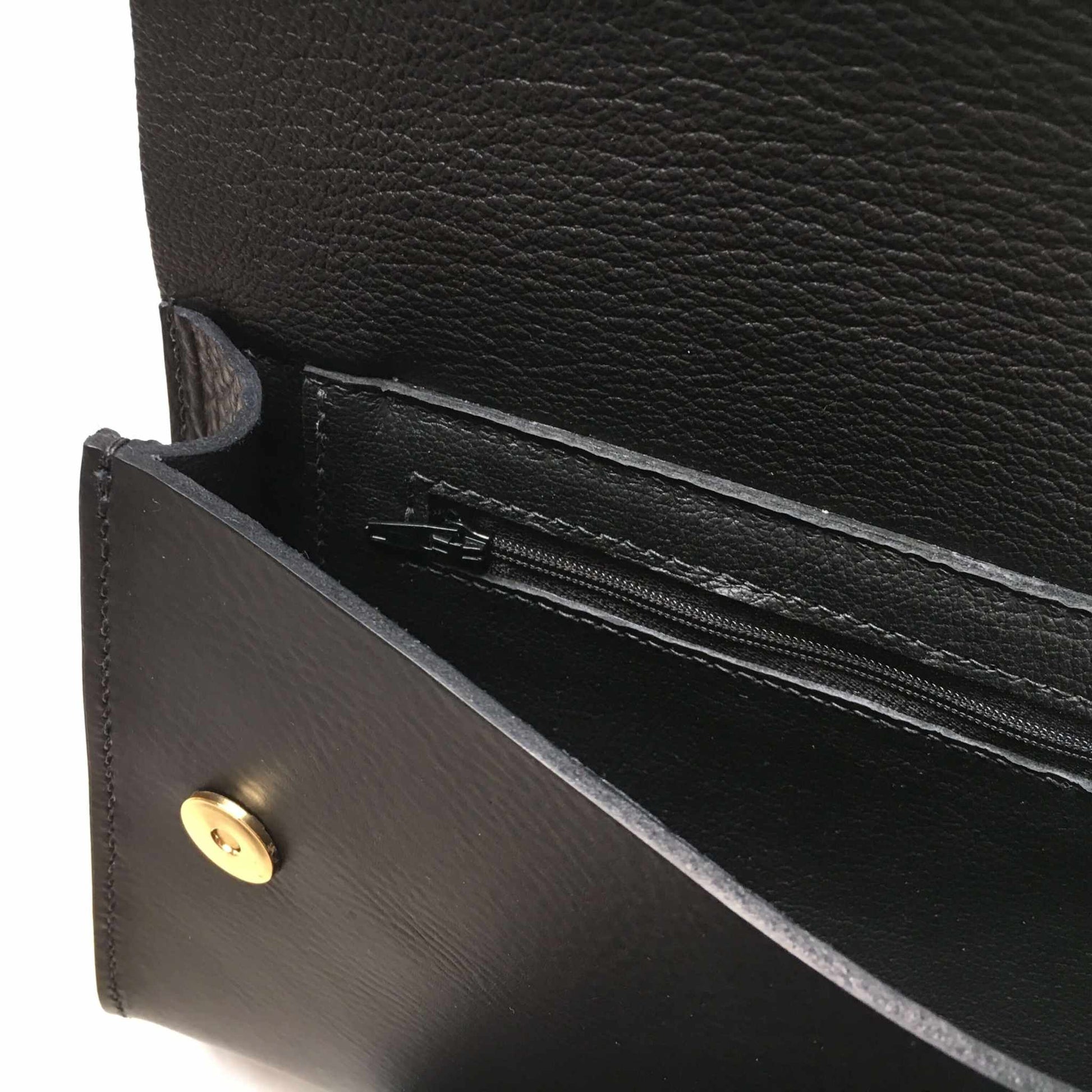 Pioneer Midi Black Leather Crossbody Bag with zip pocket and brass detailing.