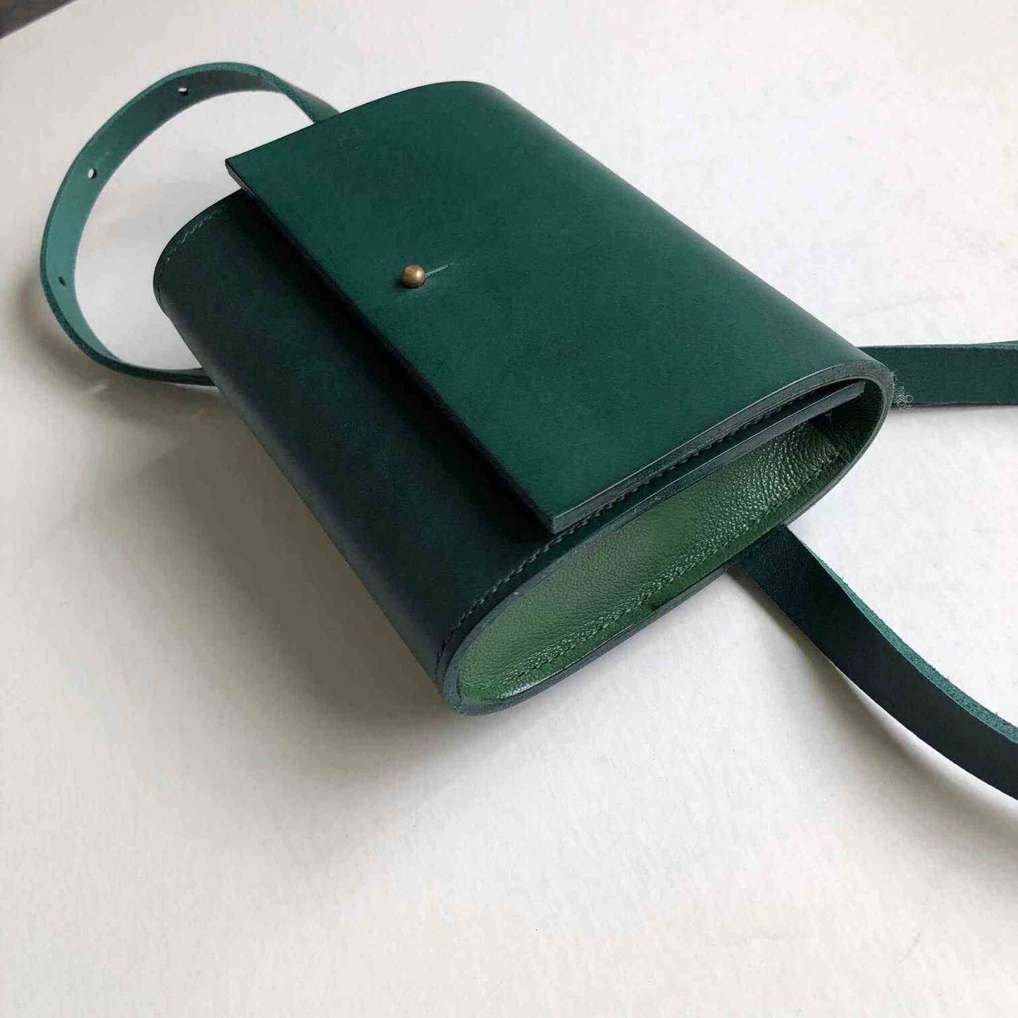 Sedna Green Leather Belt Bag by CARV, eco-friendly handcrafted design, adjustable waist belt, minimalist style.