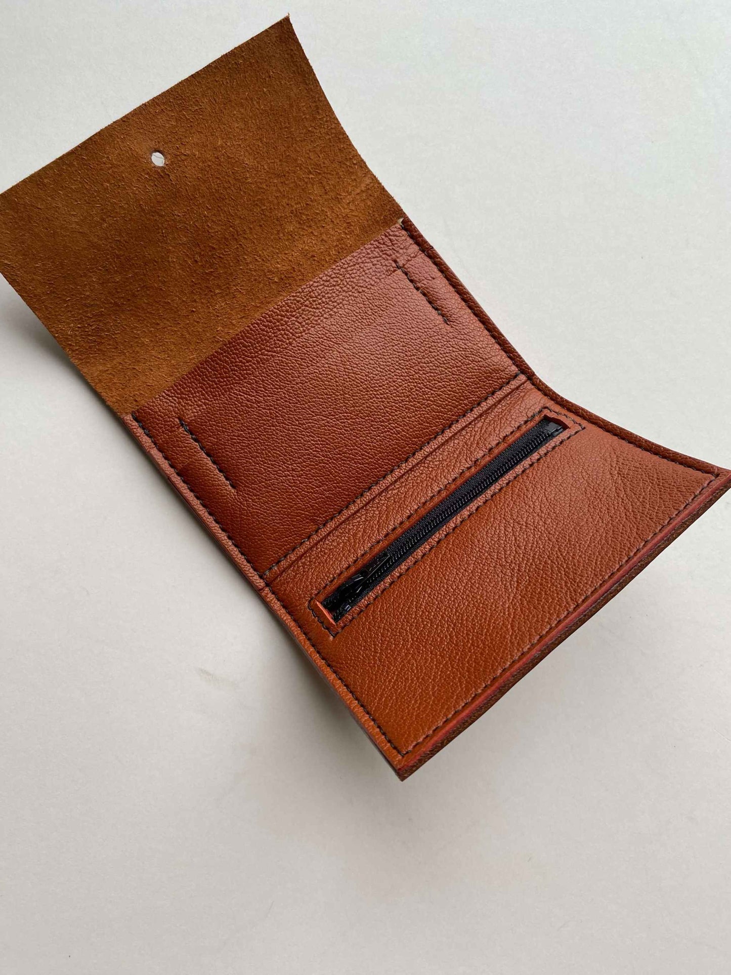 Open Nomad Mini Handmade Leather Wallet in Tan with card slots and zip pocket.