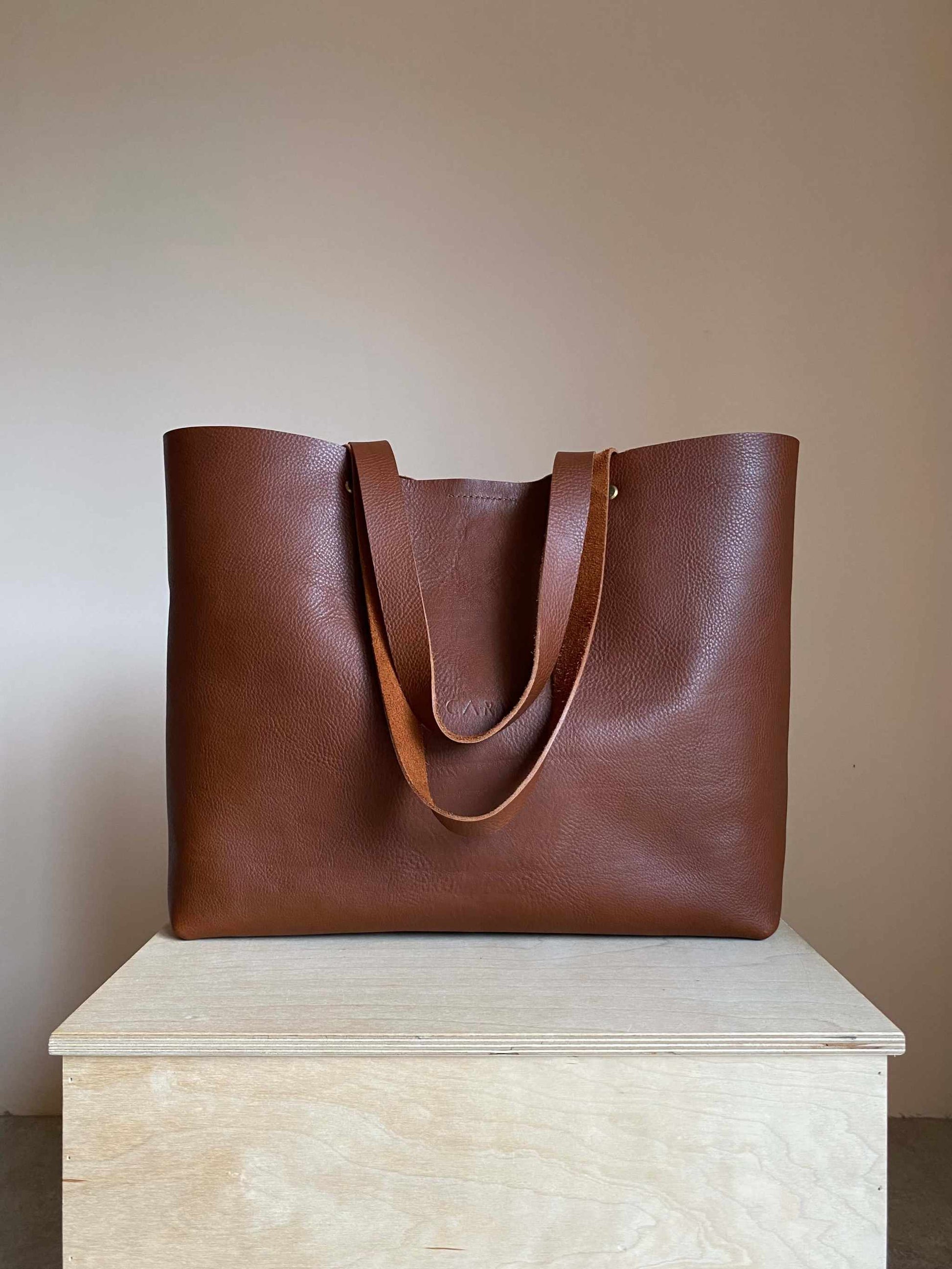 Basket Maxi Leather Tote Bag in tan, handmade, full-grain leather, versatile design, spacious interior.