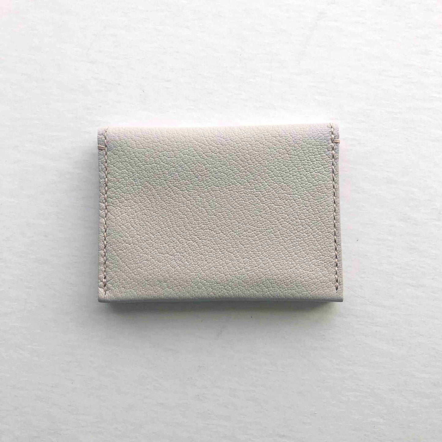 Fold Leather Bifold Card Wallet by CARV in Taupe Grey, sustainable vegetable-tanned leather, minimalist design, handcrafted in Devon.