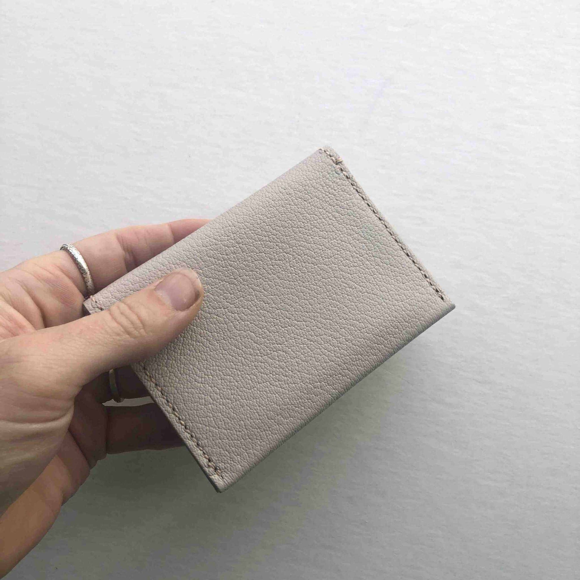 Fold Leather Bifold Card Wallet in Taupe Grey, handcrafted sustainable leather accessory.