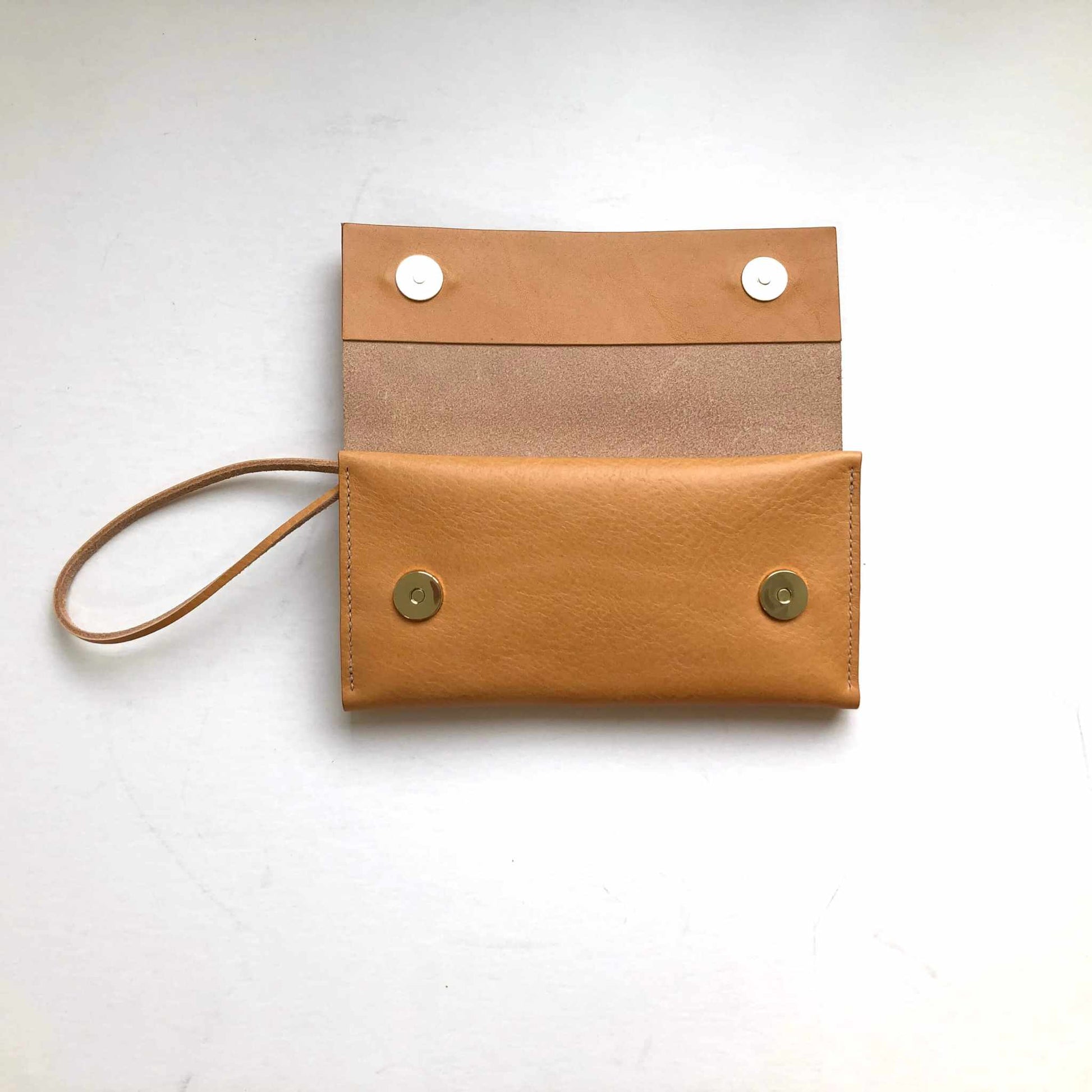 Open Knot Leather Purse Wallet in tan with strap, minimalist design, handcrafted vegetable-tanned leather, and magnetic closures.