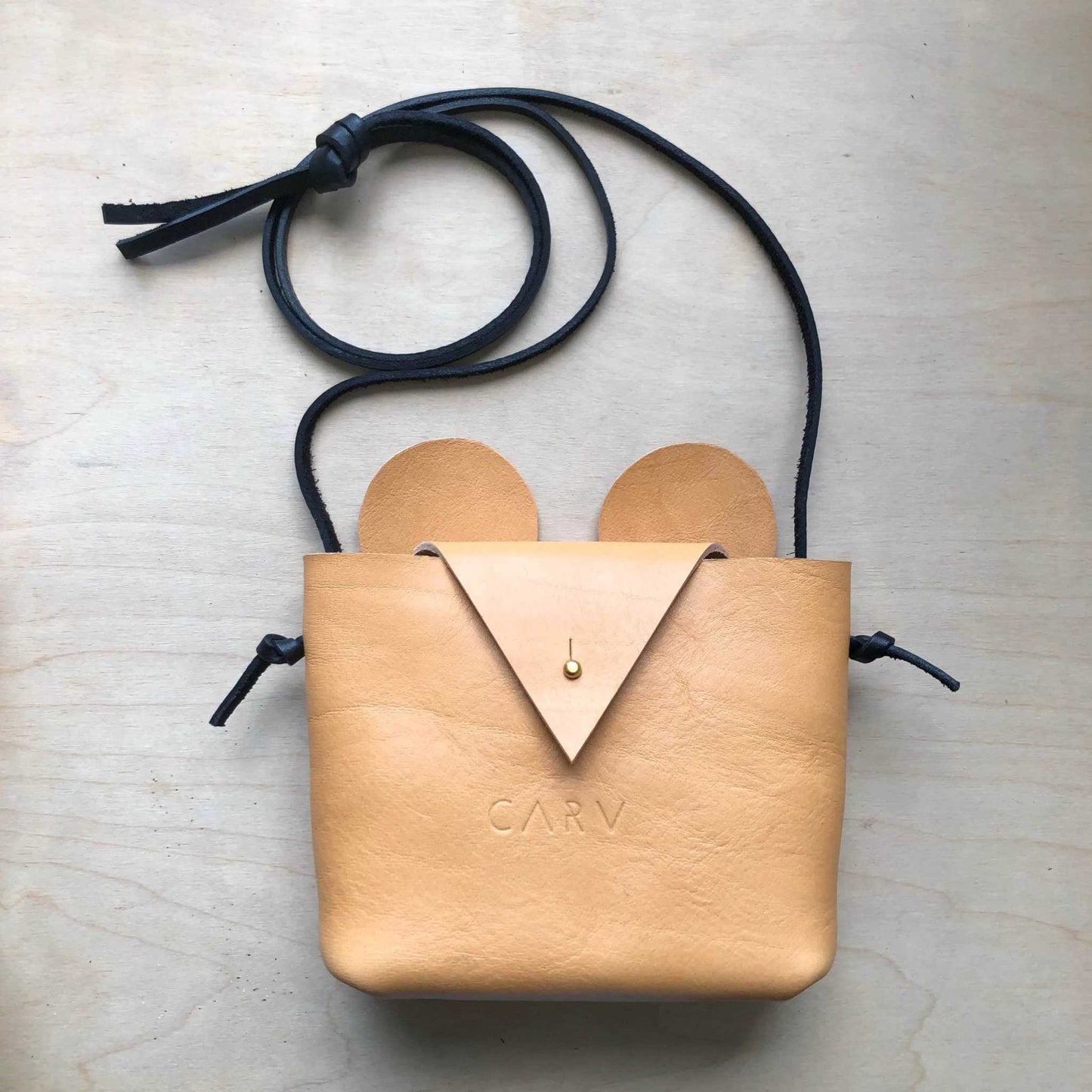 Leather Mouse Kids Crossbody Bag with natural ears and black strap.