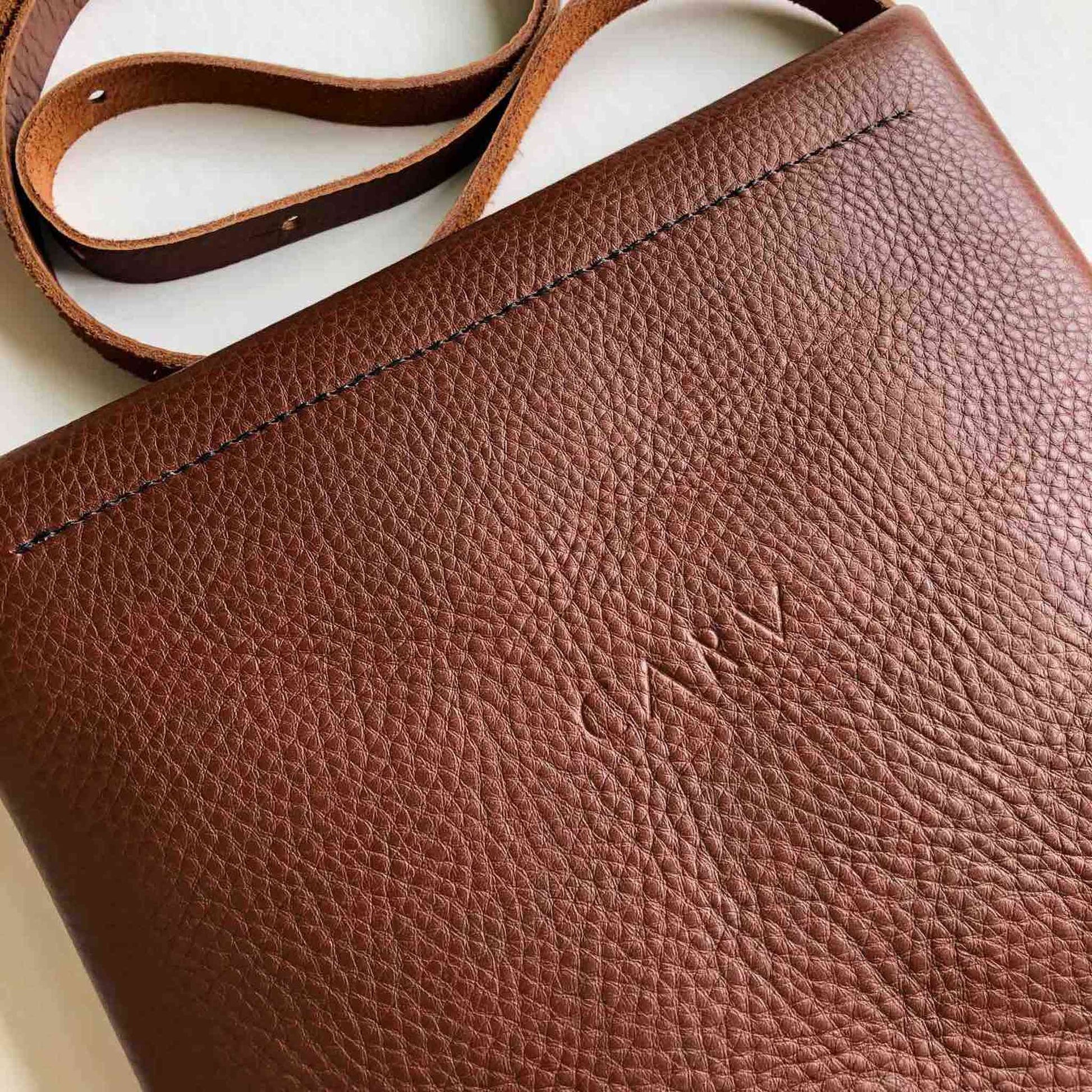 Drifter Leather Crossbody Bag in Tan, handcrafted vegetable tanned leather with adjustable strap.