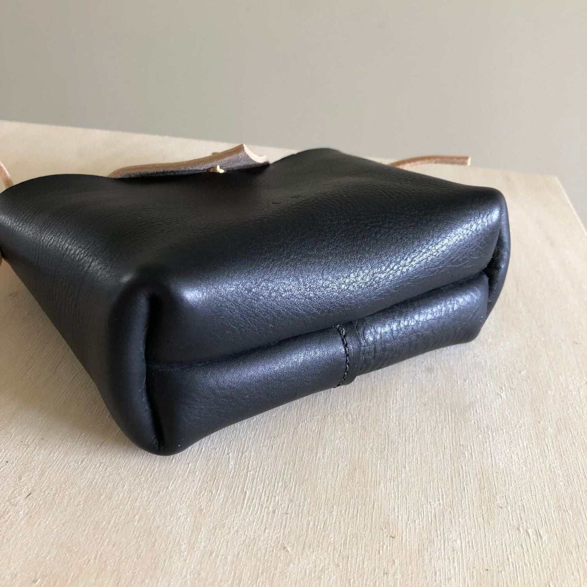 Little Mouse Kids Crossbody Bag made of black pebble leather with natural leather ears and nose, showcasing handcrafted quality and sustainable design.