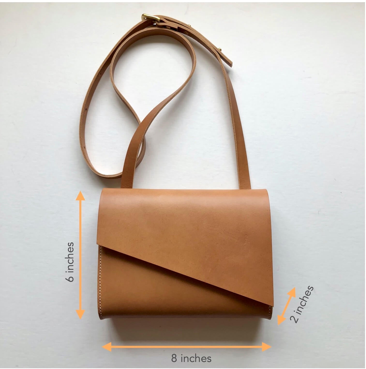 Dimensions of the CARV Pioneer Mini leather crossbody bag in sand colour