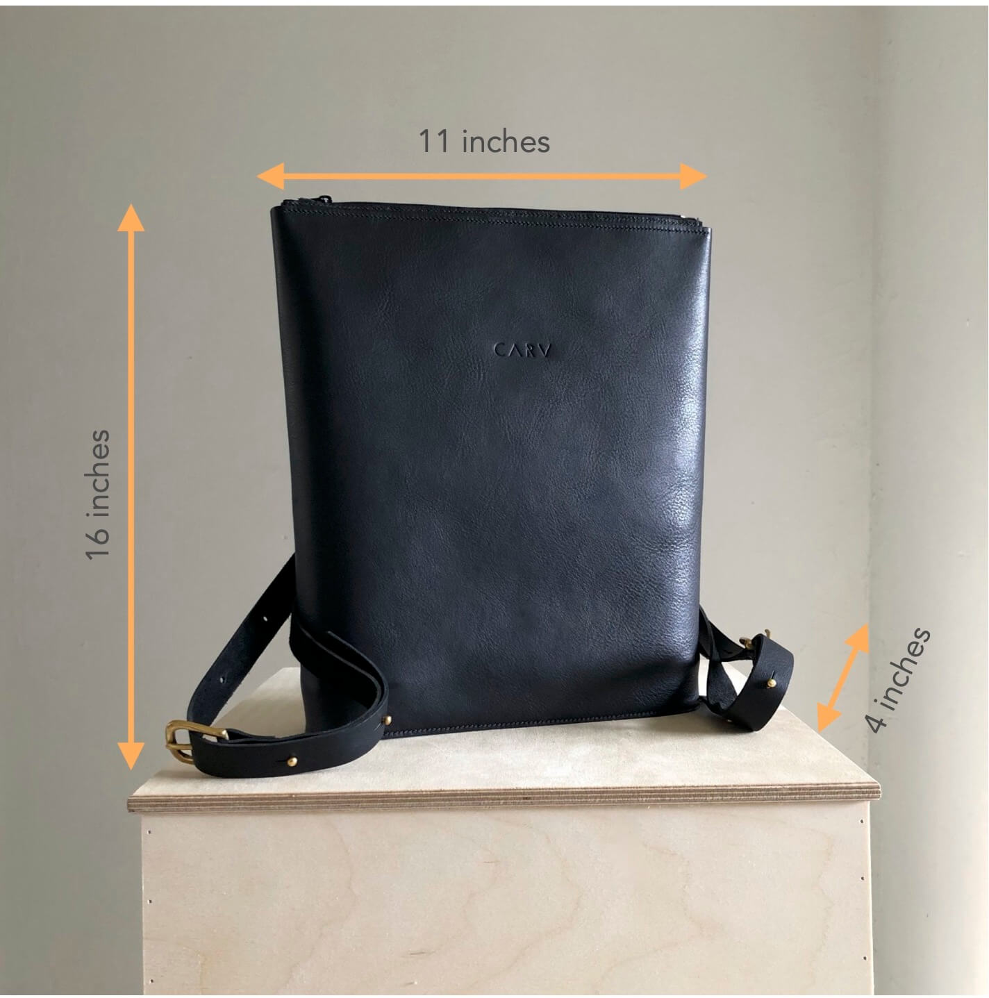 Diagram showing the dimensions of the Vita minimalist black leather backpack by CARV