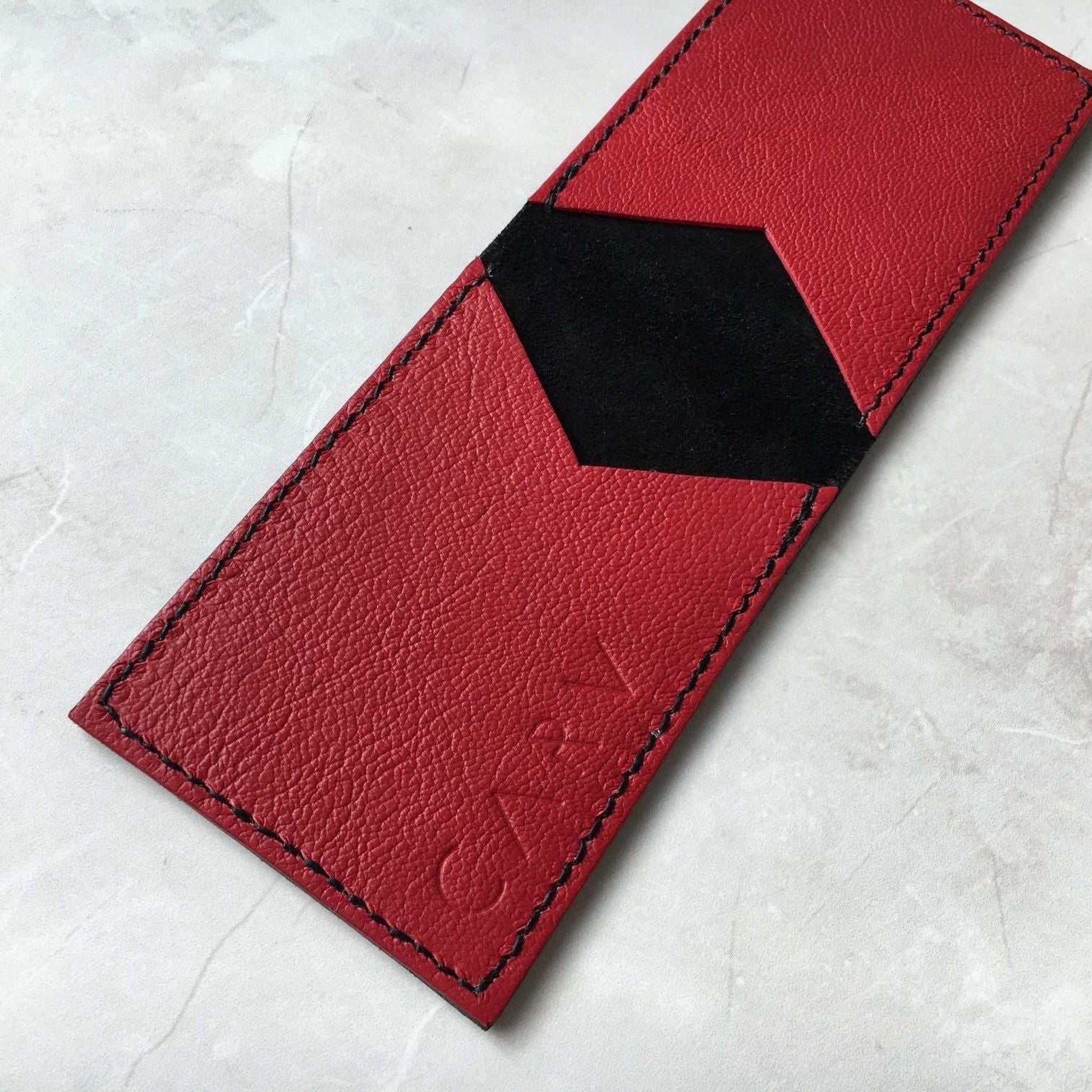 Nomad Leather Bifold Card Wallet, red with black detail, sustainable vegetable-tanned leather, minimalist design, customizable with initials.