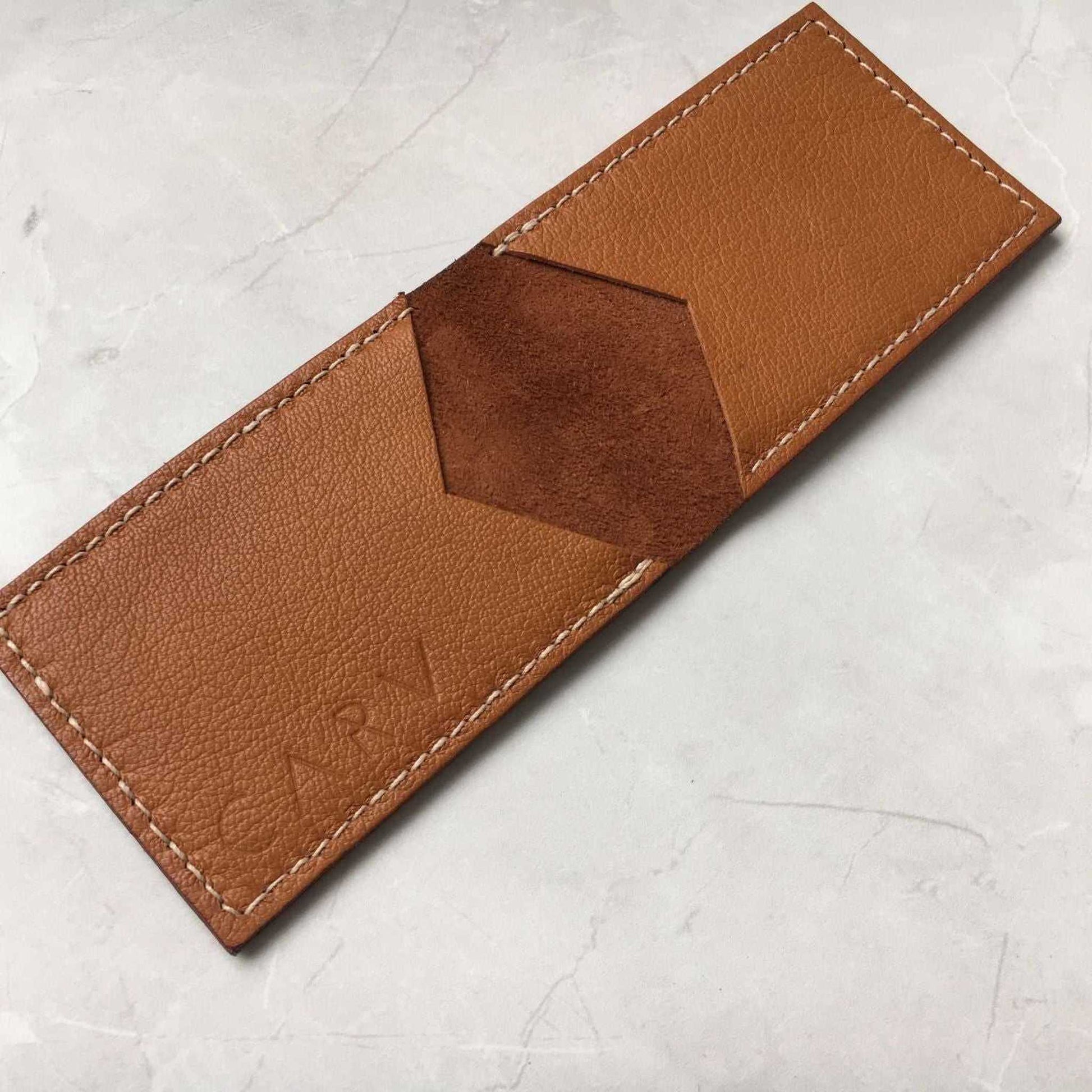 Nomad Leather Bifold Card Wallet in sustainable vegetable-tanned leather, minimalist design, handmade in Devon, UK.