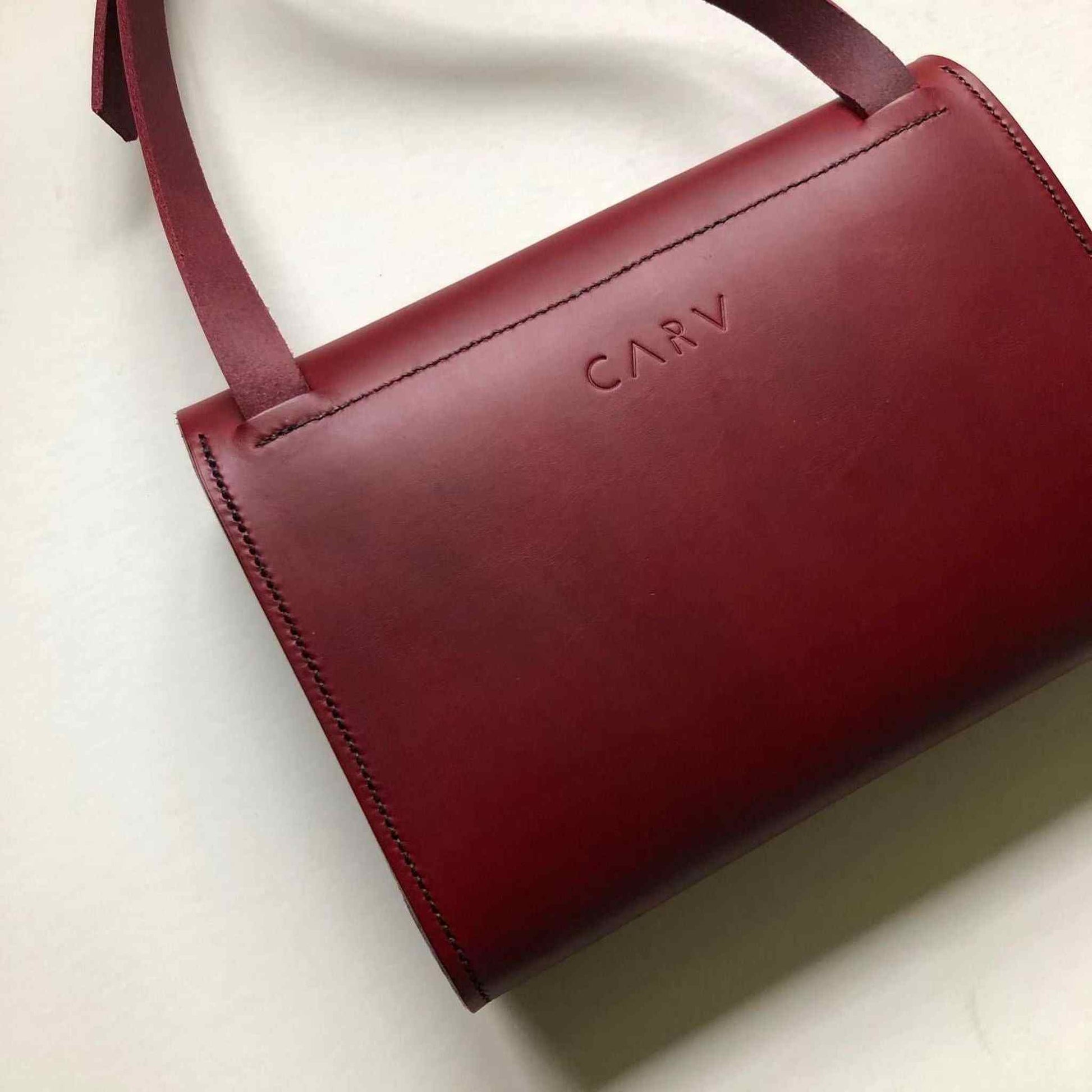 Pioneer Midi Red Leather Crossbody Bag by CARV, handcrafted, minimalist design, sustainable vegetable-tanned leather.